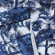 Blue palm tree pattern on a white background