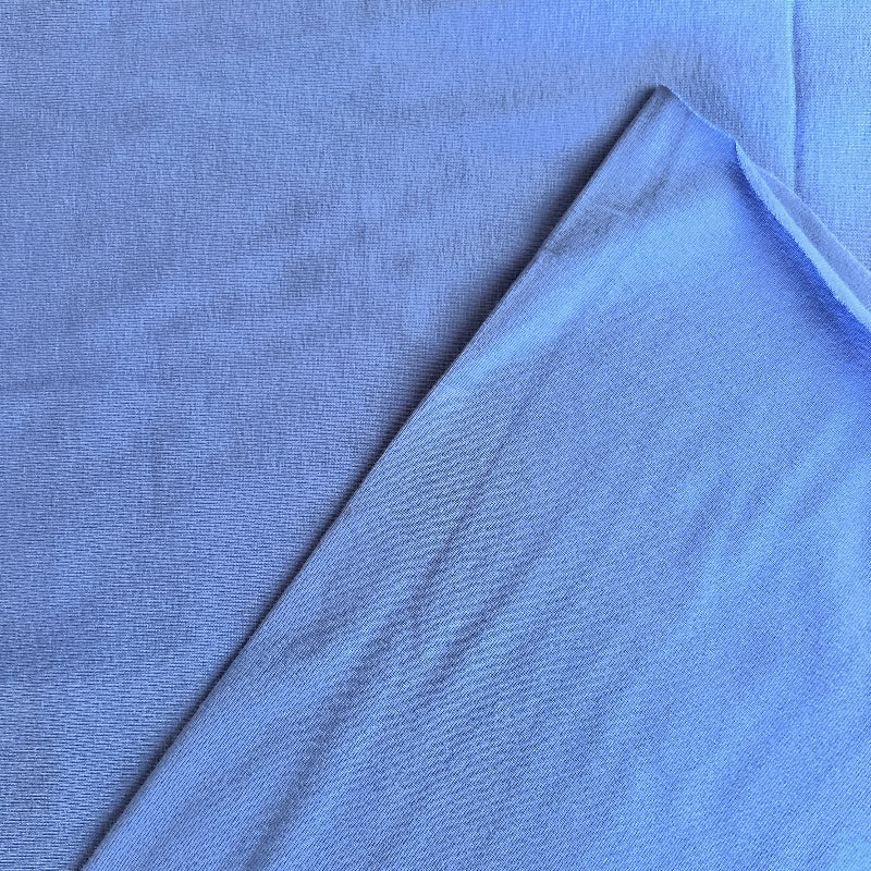 Close-up of blue fabric with a slight texture