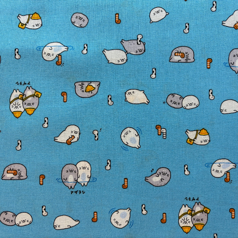 Pattern of cartoon-like characters on a blue background