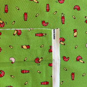Fabric with shrimp pattern on a green background