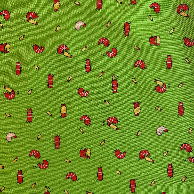 Pattern of shrimp and ebi on a green background