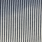 Close-up of fabric with black and white stripes