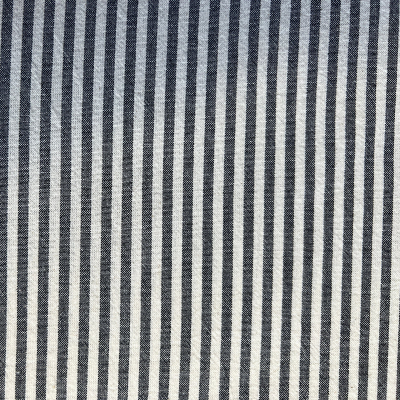 Close-up of fabric with black and white stripes