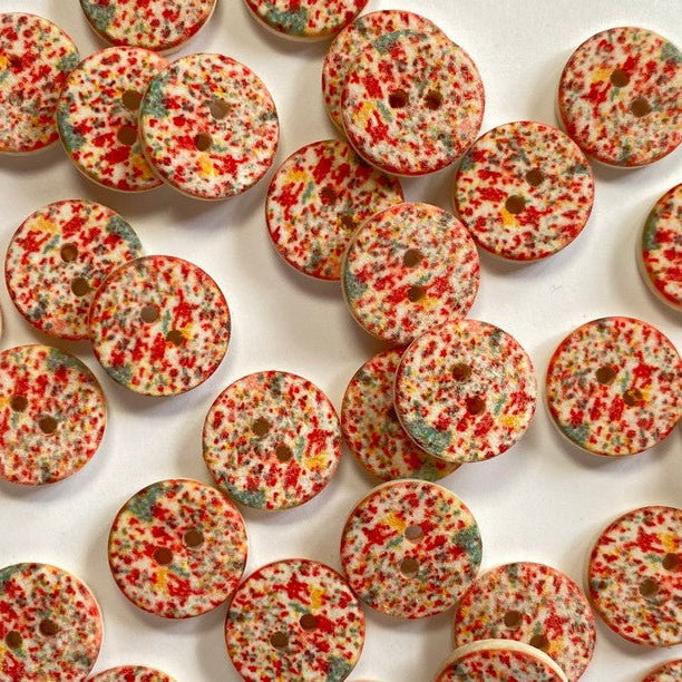 Textile Garden - Coconut Shell Button - 12mm - Pale Background with Pink, Yellow, and Green Speckles