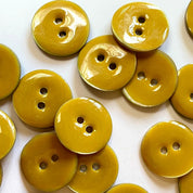 Yellow buttons on a white background