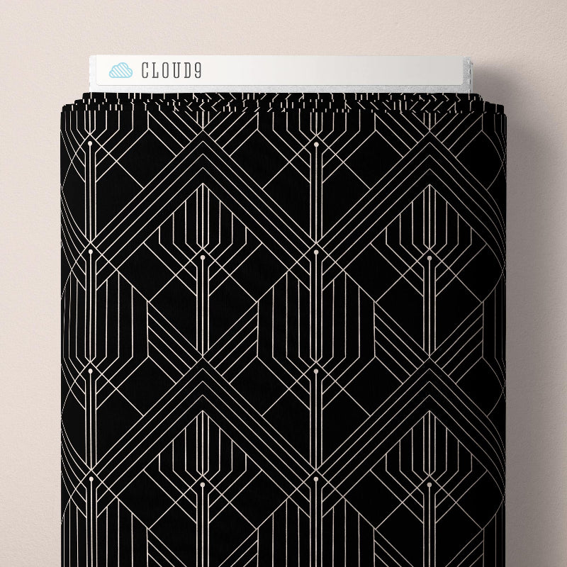 Black geometric patterned product with 'Cloud9' branding on a beige background