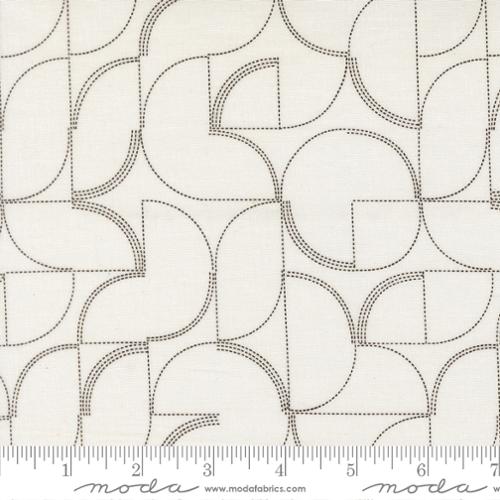 Fabric with gray geometric designs in a dashed line on a pearl colored background.