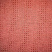 Textured pink fabric pattern