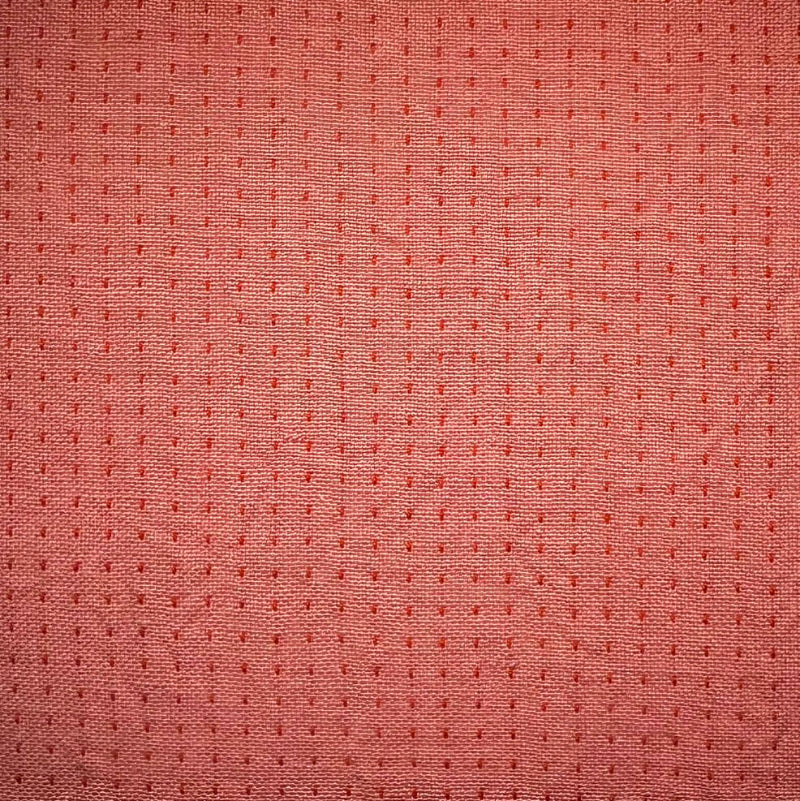 Textured pink fabric pattern