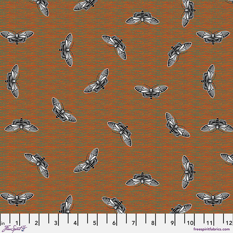 Pattern of monochrome moths on an orange and green fabric.