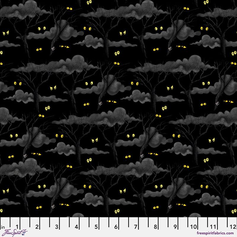 Fabric with a pattern of trees with glowing eyes on a black background, with a fabric swatch at the bottom.