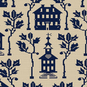 Patterned fabric with blue houses and trees on a beige background