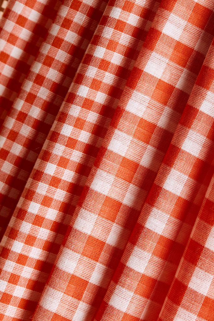 Close-up of orange and white checkered fabric
