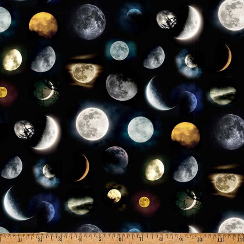 Fabric with moon phases pattern on a black background