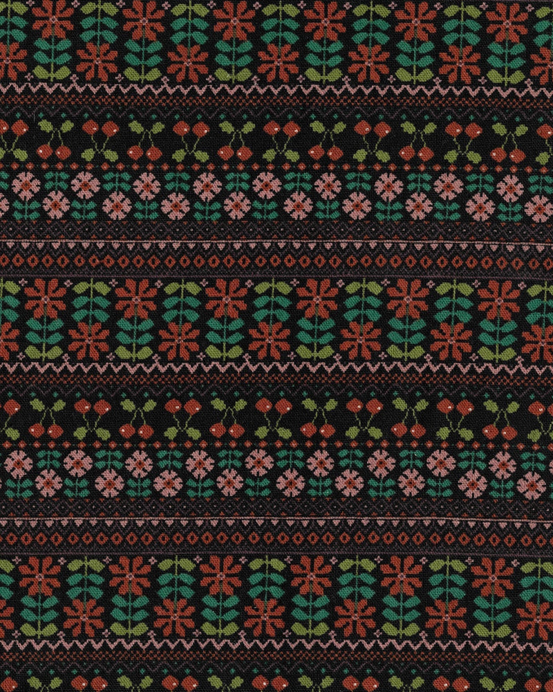 Patterned fabric with floral design on a black background