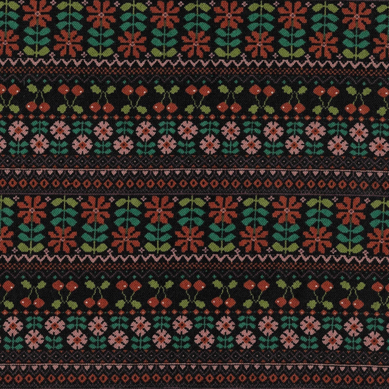 Patterned fabric with floral design on a black background