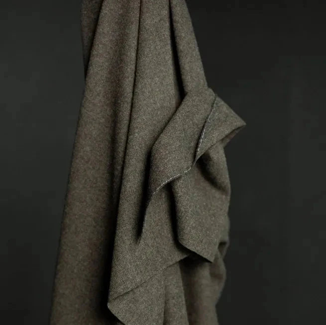 Draped grey/brown coating