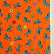 Cosmo - Cotton Sheeting - Orange with Blue Horses