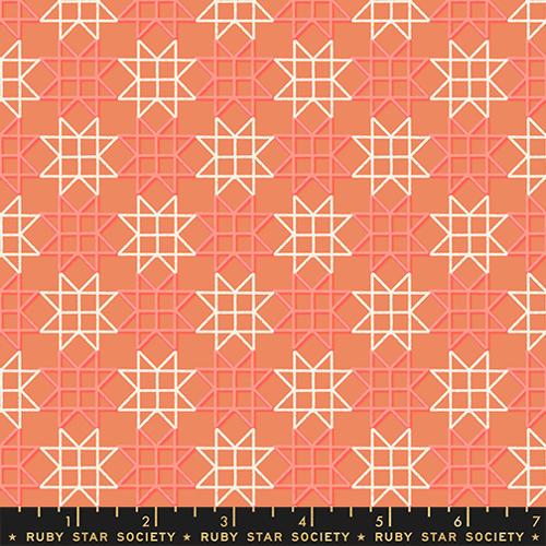 Geometric star pattern on a coral background with a ruler at the bottom.