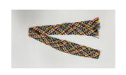 Multicolored braided scarf on a white background
