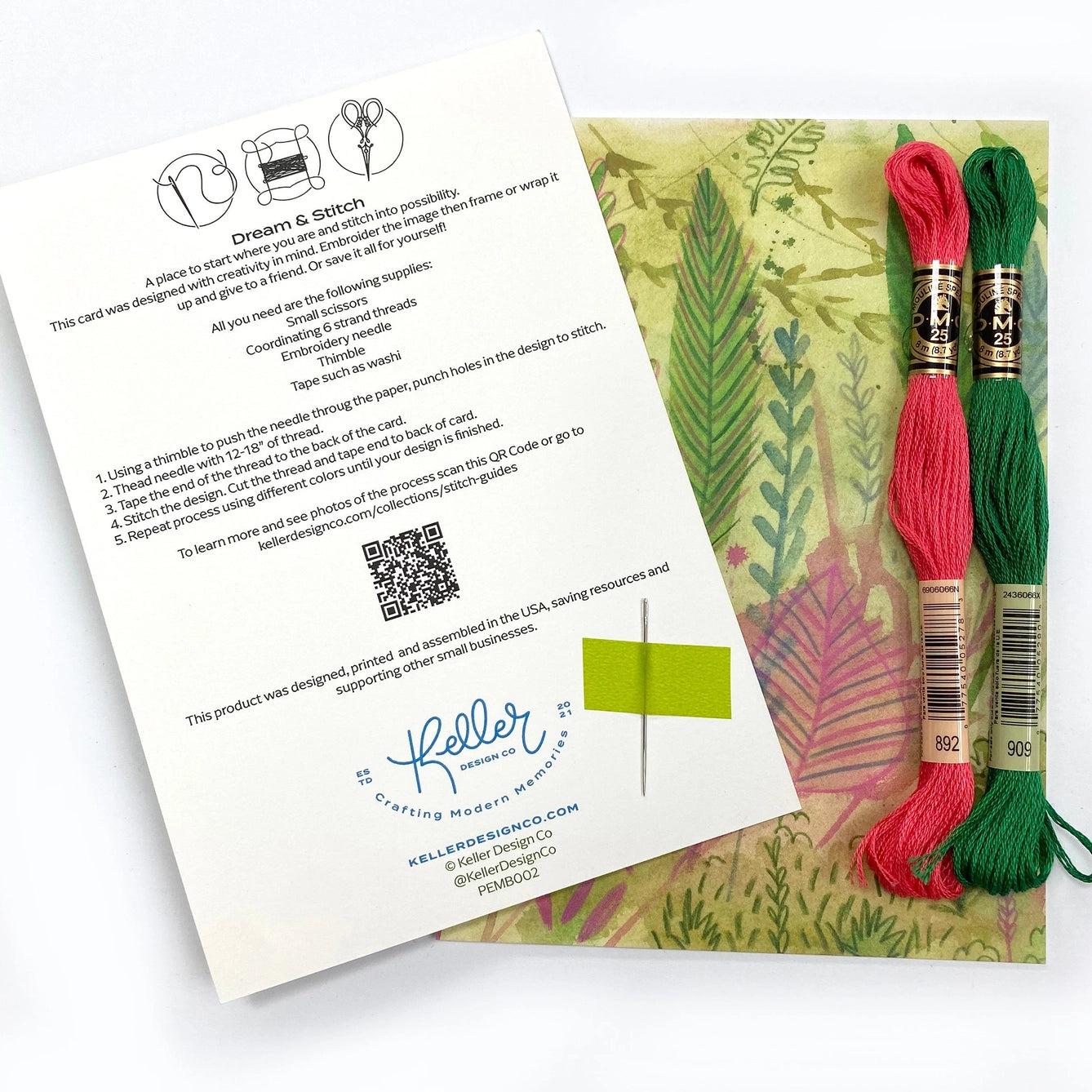 Embroidery kit with red and green thread on a card featuring instructions and branding.