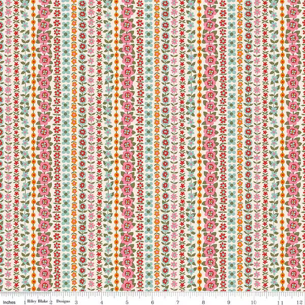 Floral patterned fabric with a ruler for scale on a white background