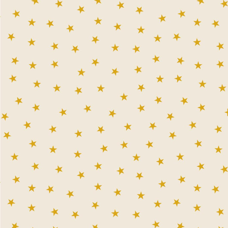 Fabric with gold metallic stars on a cream background.