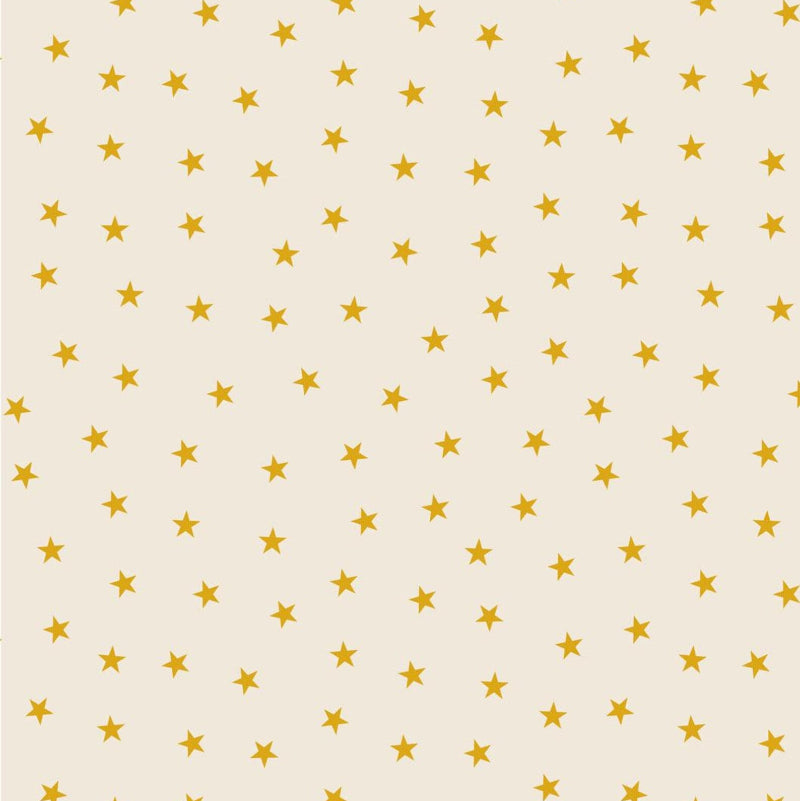 Fabric with gold metallic stars on a cream background.
