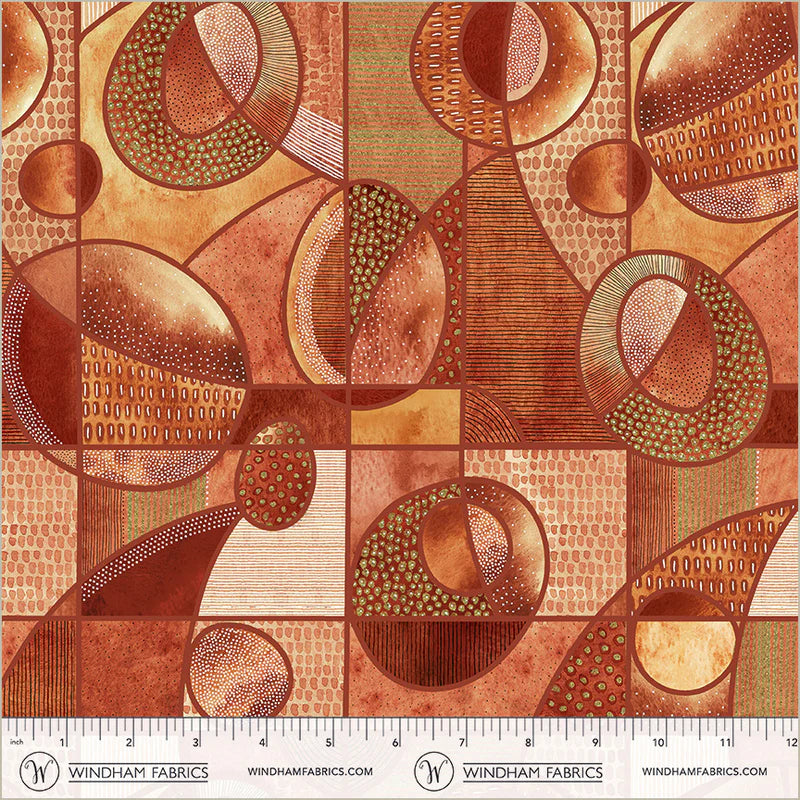 Textile with abstract circular patterns in brown and beige, featuring a ruler at the bottom for scale.