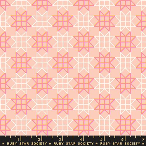 Geometric pattern fabric with pink and white stars on a pink background, featuring Ruby Star Society label.