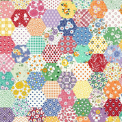 Colorful patchwork pattern with various shapes and floral designs.