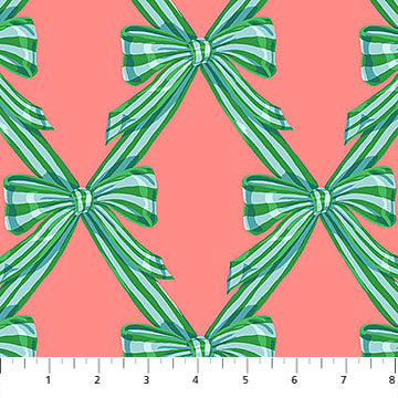 Fabric with a coral pink background, and blue and green bows in a lattice pattern.